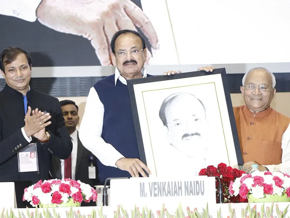 Nandan jha Facilitating Shri M.Venkaiah Naidu Vice President of India
