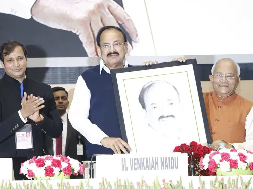Nandan jha Facilitating Shri M.Venkaiah Naidu Vice President of India